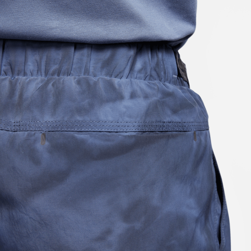 MEN'S NIKE SPORTSWEAR TECH PACK PANTS "DIFFUSE BLUE"