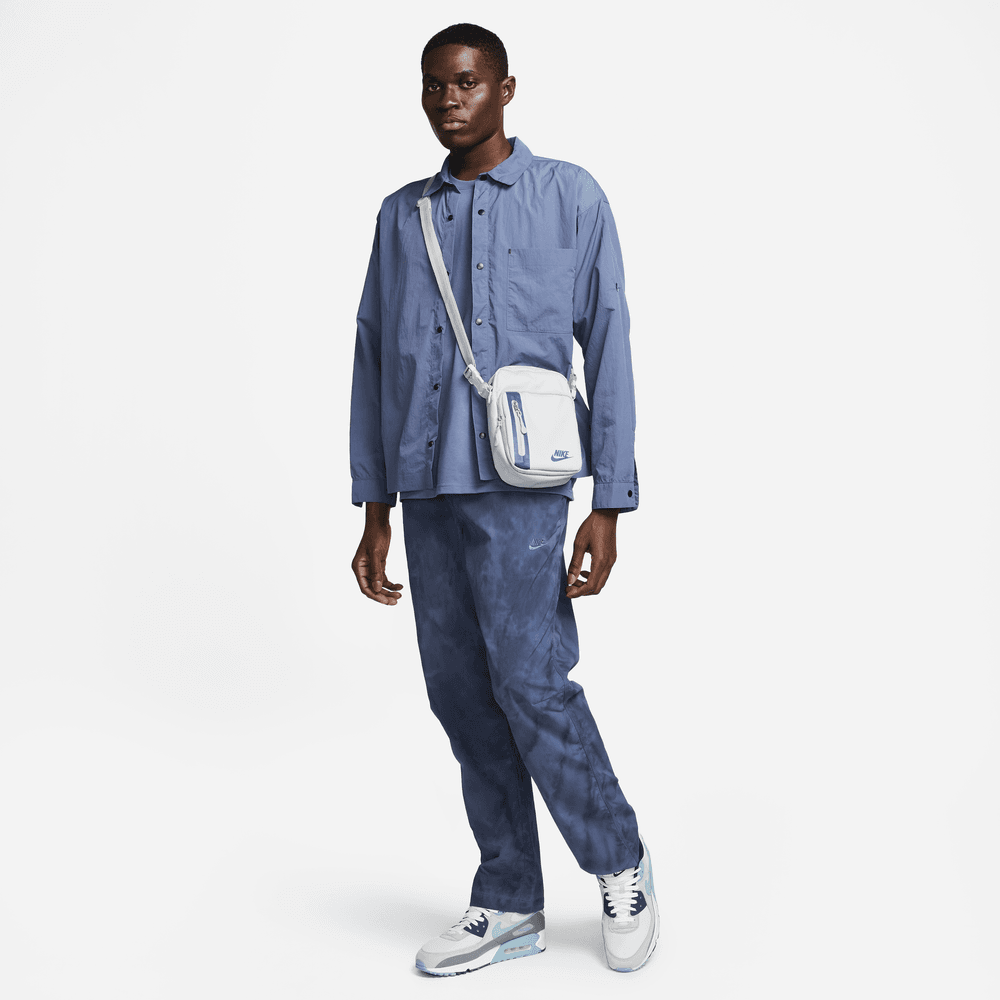 MEN'S NIKE SPORTSWEAR TECH PACK PANTS "DIFFUSE BLUE"