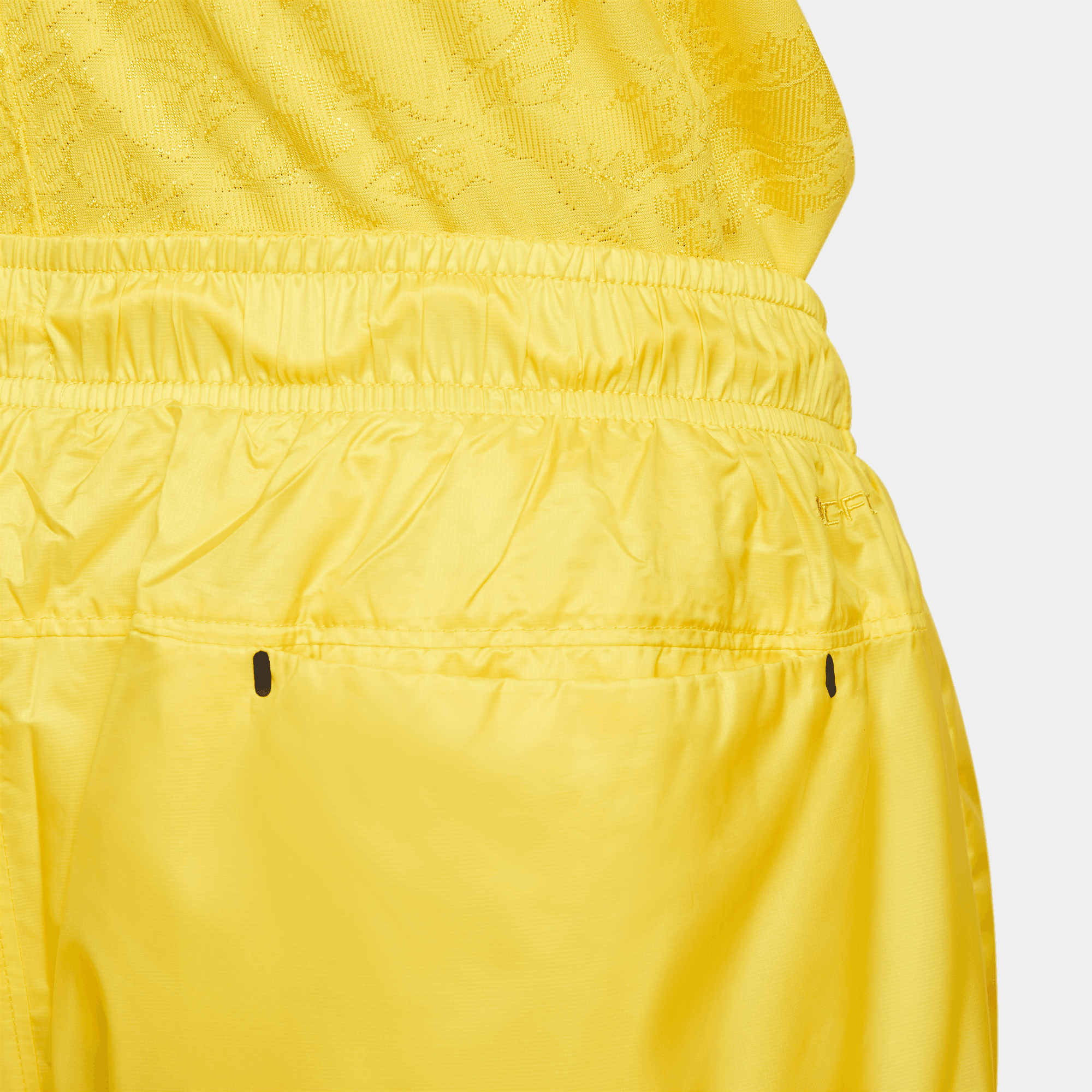 NIKE SPORTSWEAR TECH PACK SHORTS "YELLOW"